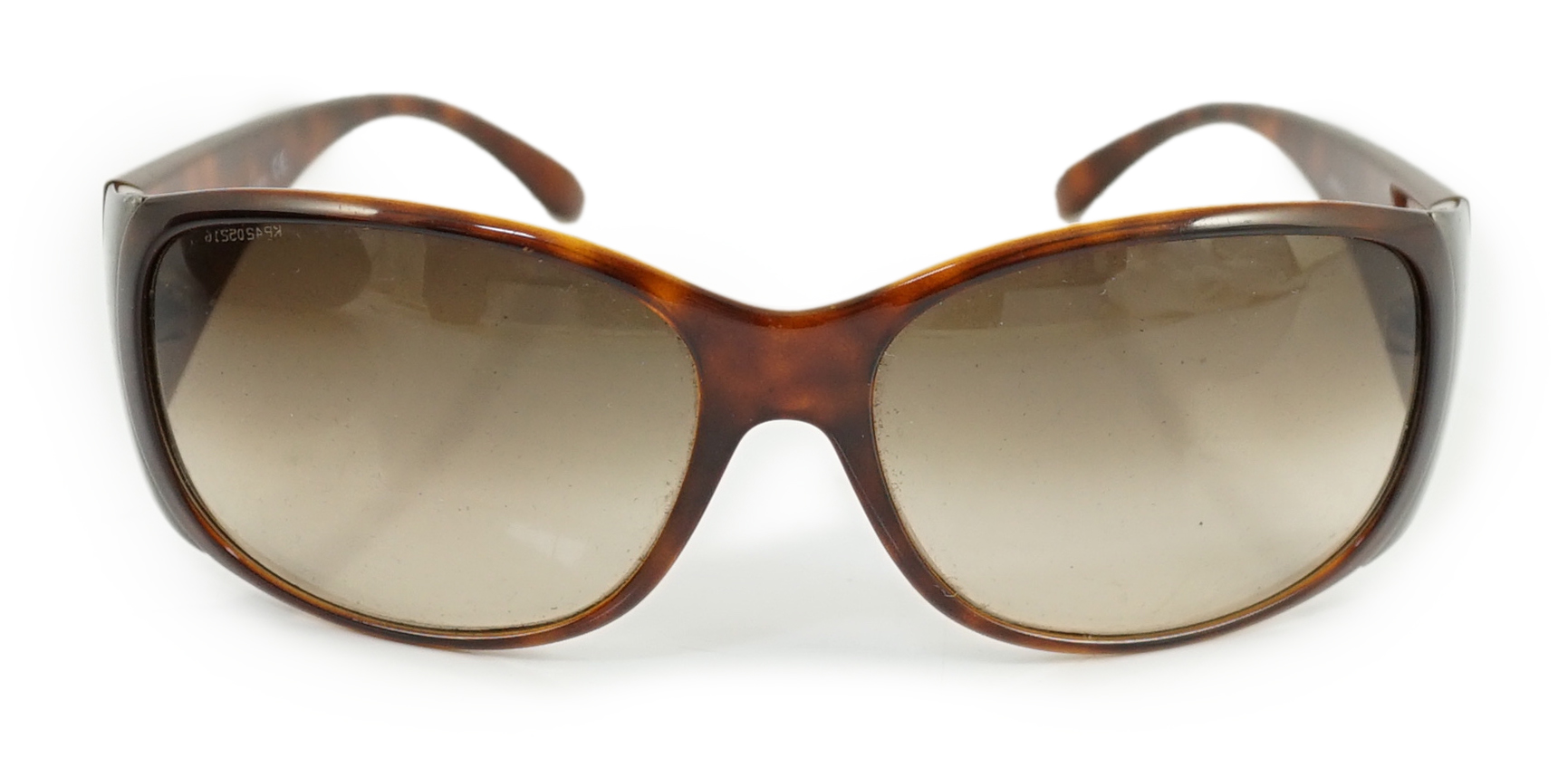 A pair of Prada tortoiseshell sunglasses